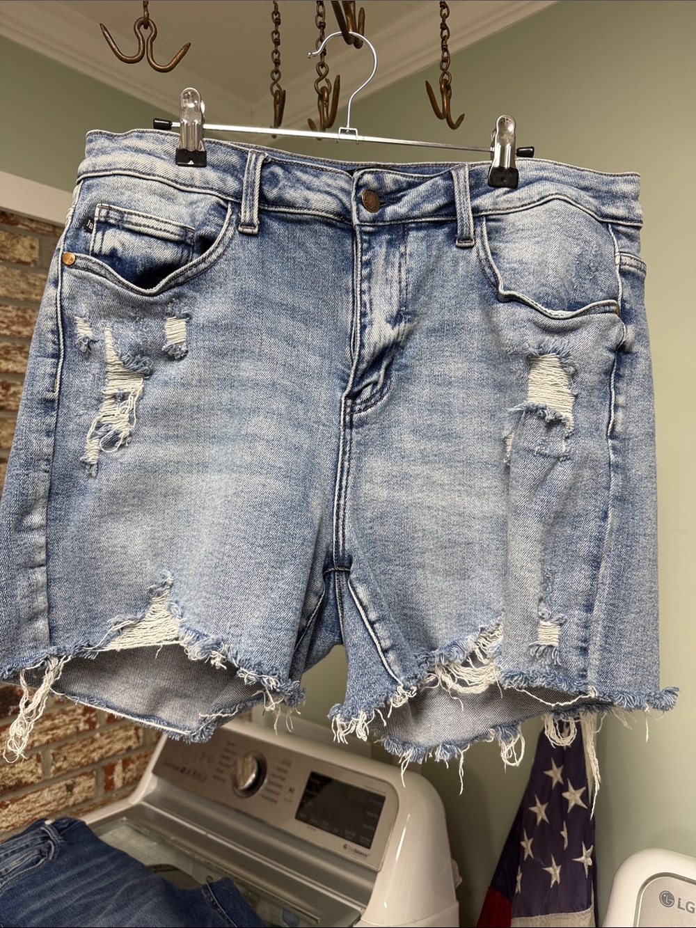 Judy Blue Medium Wash Distressed Denim Shorts.